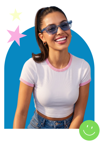 A smiling woman in sunglasses poses confidently against a blue background